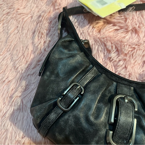 Marc Jacobs
The Distressed Buckle J Marc Crescent bag - Picture 5 of 12